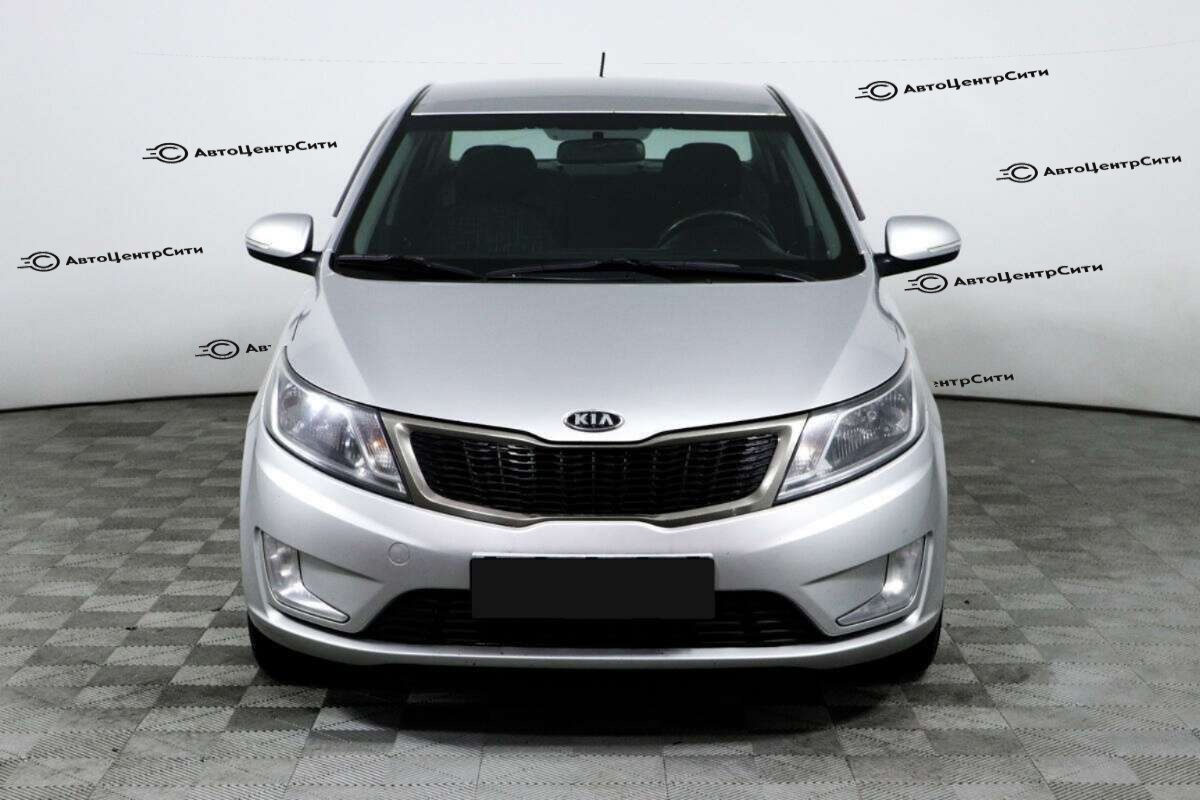 Kia Rio с пробегом — 2012 год. Фото: #1