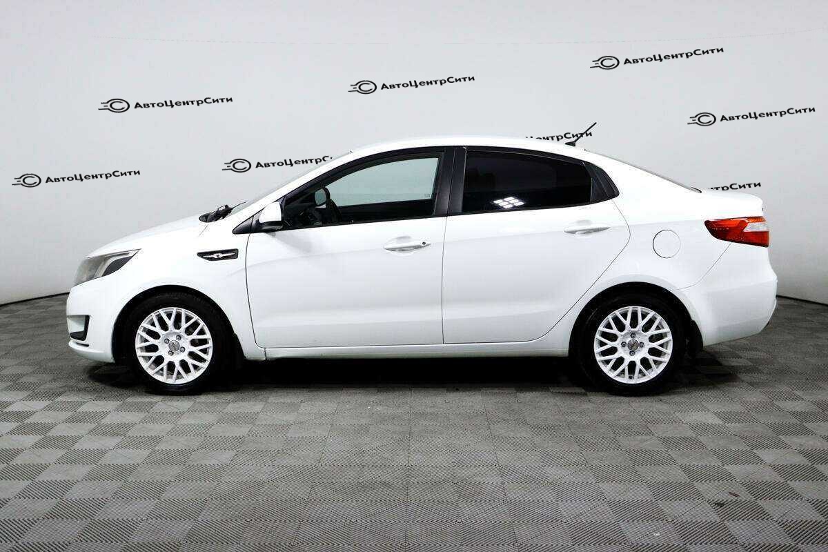Kia Rio с пробегом — 2012 год. Фото: #7
