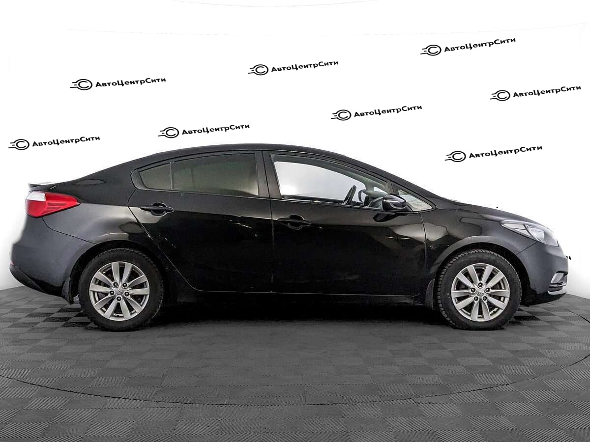 Kia Cerato с пробегом — 2015 год. Фото: #3