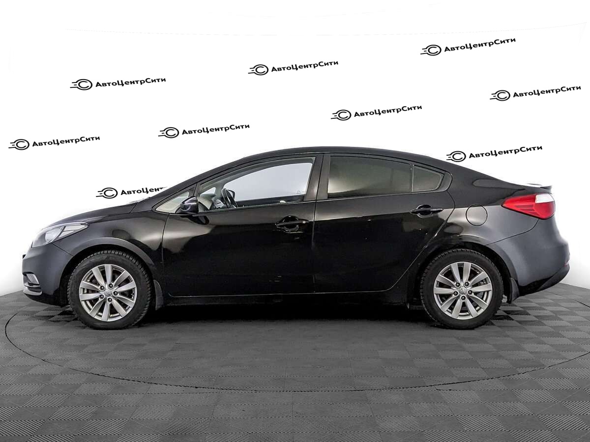 Kia Cerato с пробегом — 2015 год. Фото: #7