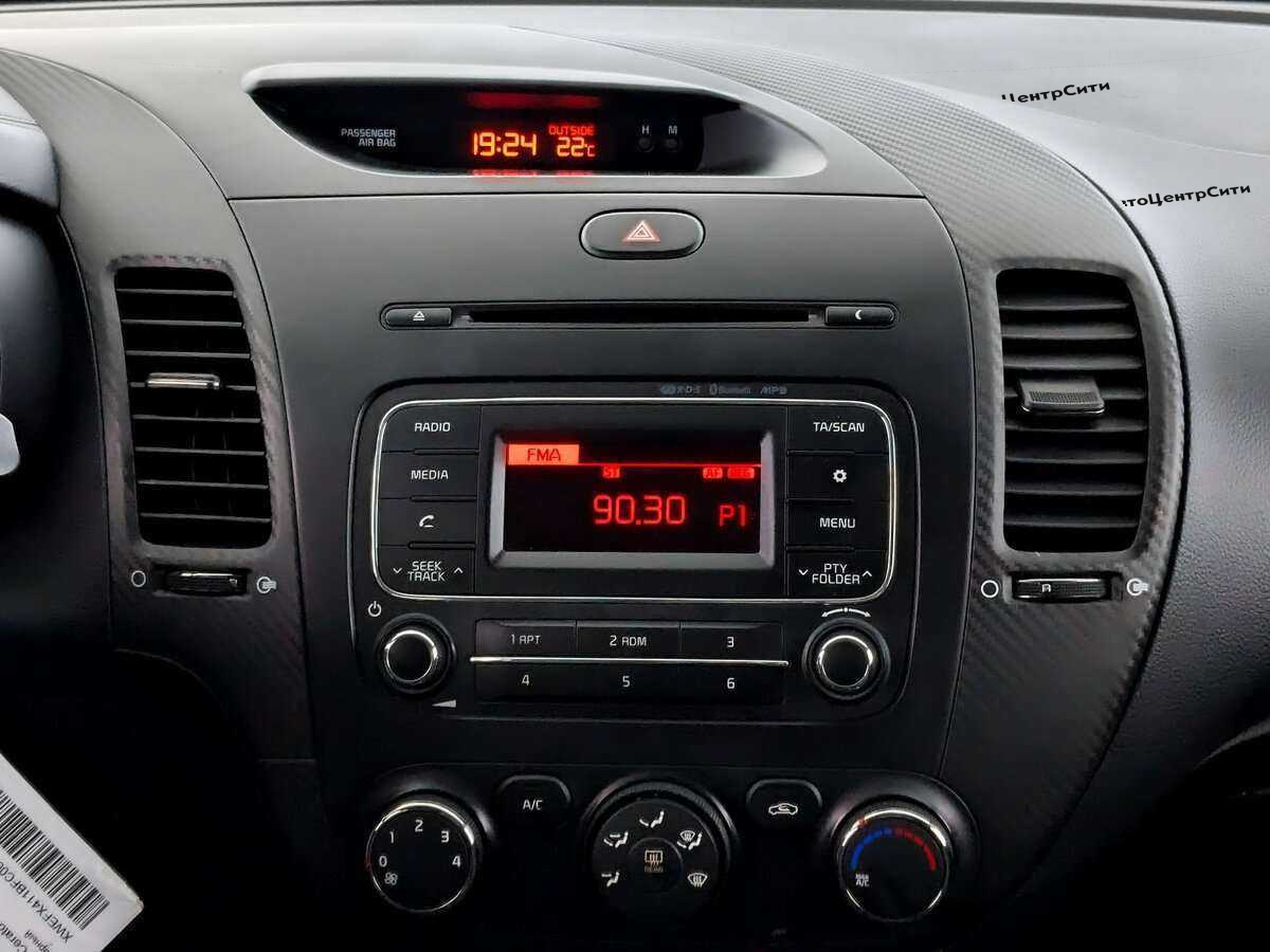 Kia Cerato с пробегом — 2015 год. Фото: #12