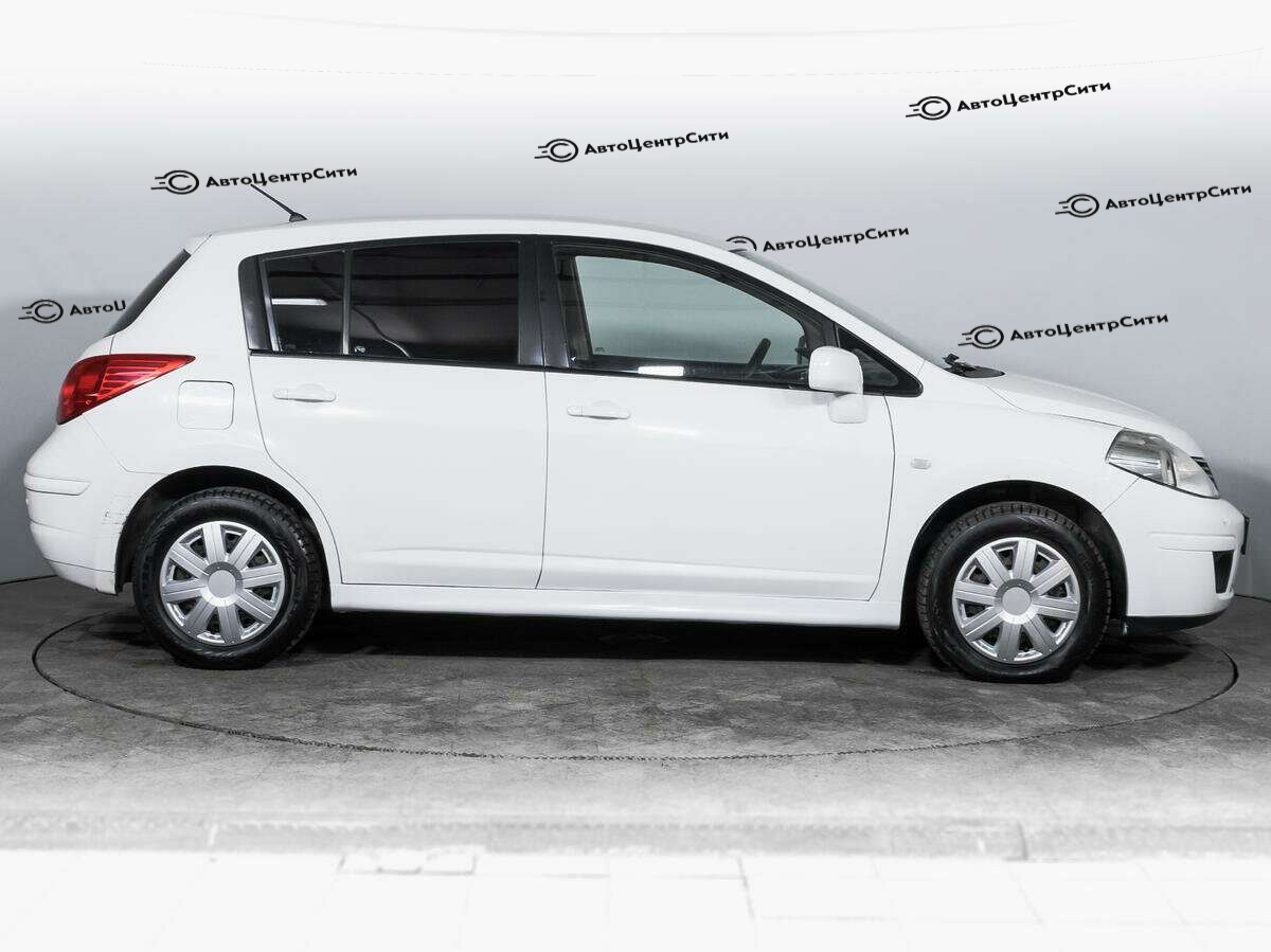 Nissan Tiida с пробегом — 2013 год. Фото: #3