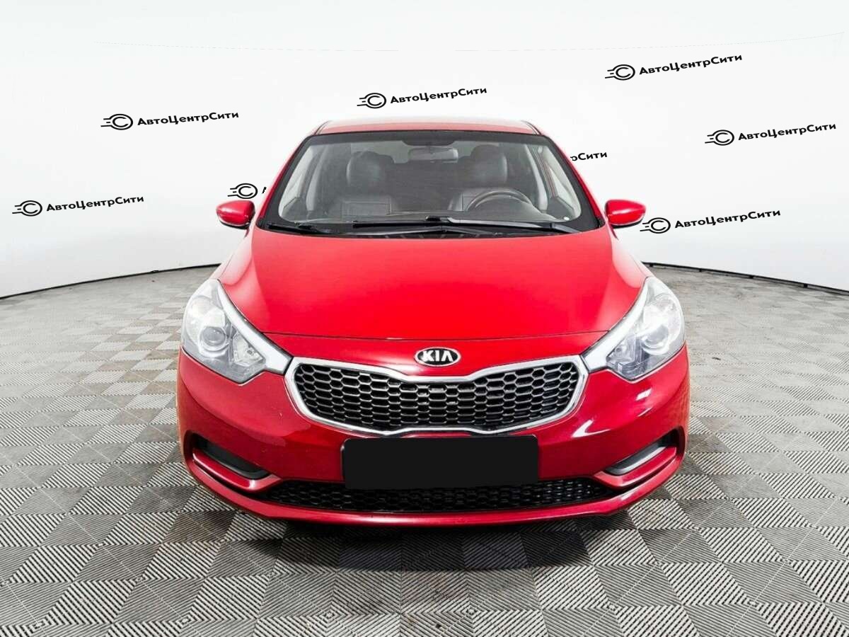 Kia Cerato с пробегом — 2013 год. Фото: #1