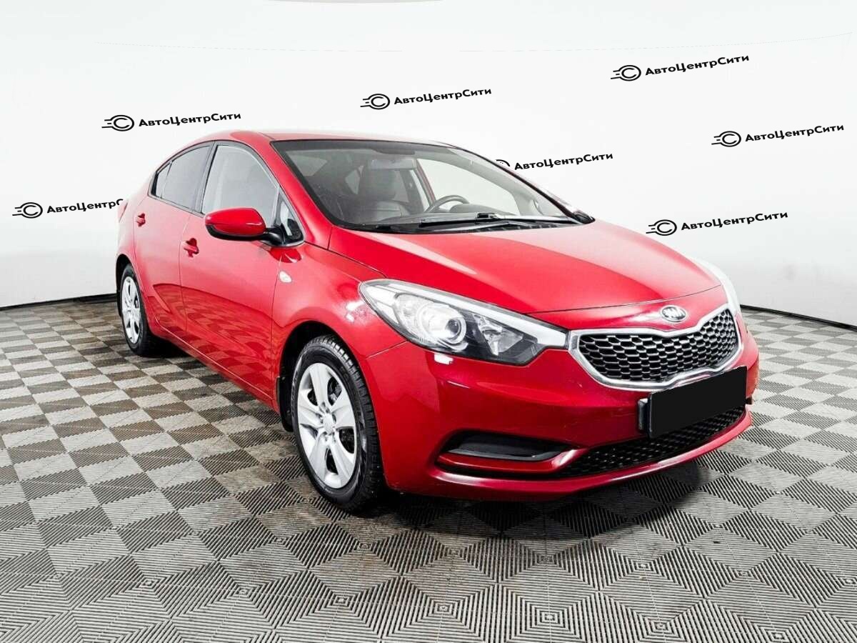 Kia Cerato с пробегом — 2013 год. Фото: #2