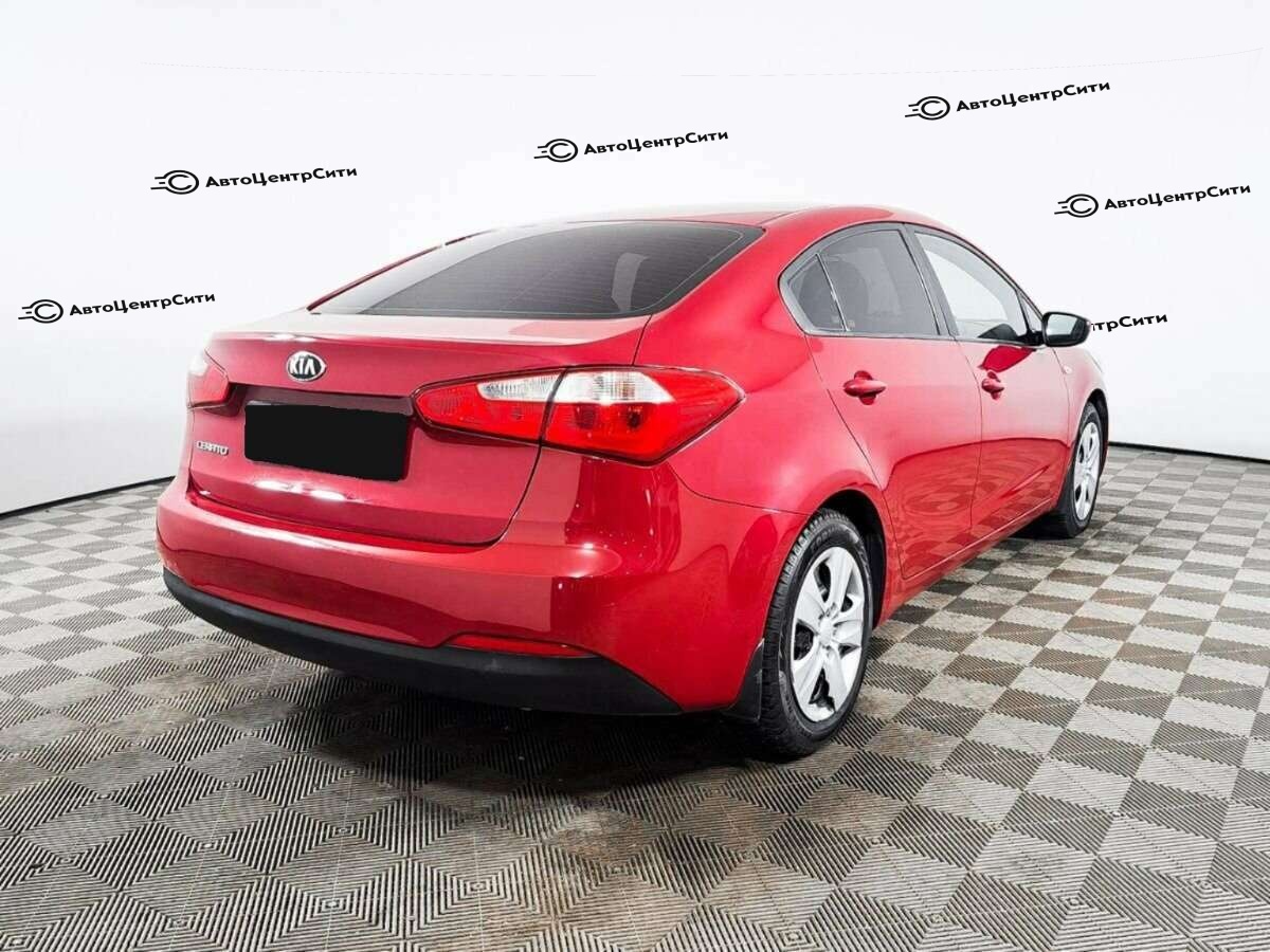 Kia Cerato с пробегом — 2013 год. Фото: #3