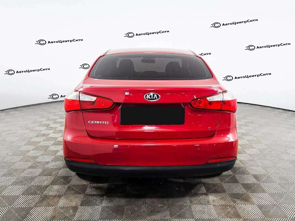 Kia Cerato с пробегом — 2013 год. Фото: #4