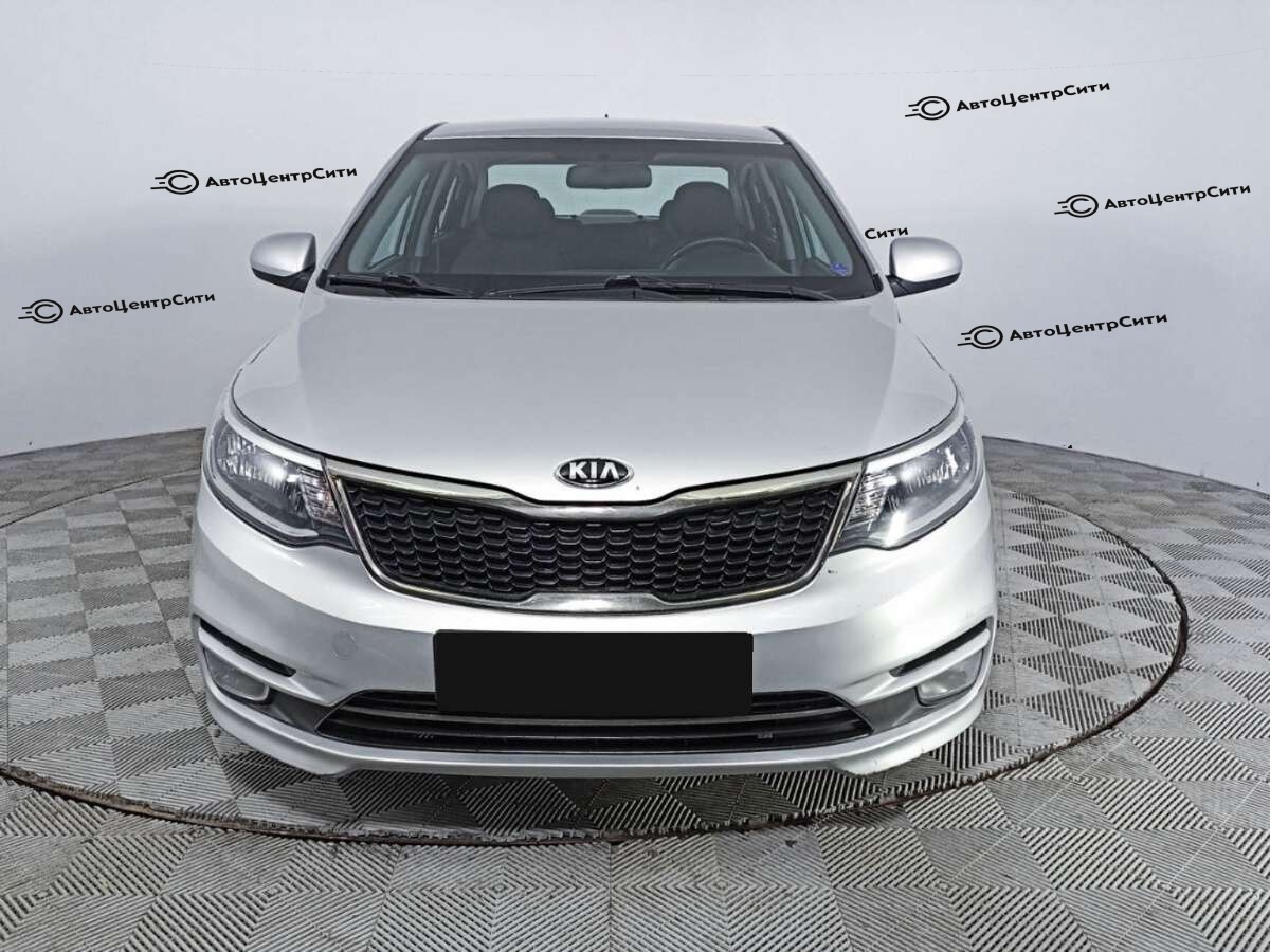 Kia Rio с пробегом — 2015 год. Фото: #1