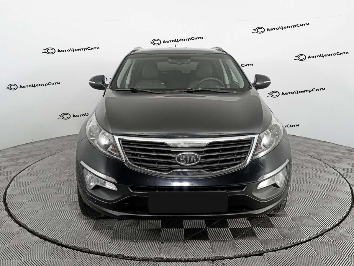 Kia Sportage с пробегом — 2012 год. Фото: #1