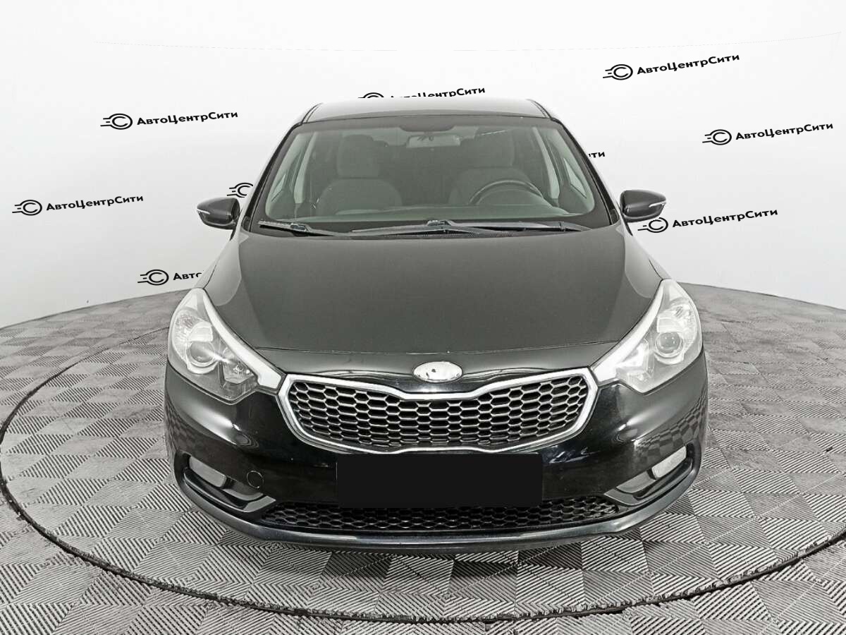 Kia Cerato с пробегом — 2013 год. Фото: #1