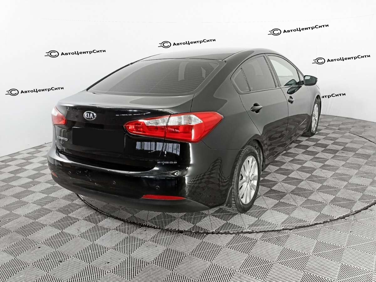 Kia Cerato с пробегом — 2013 год. Фото: #4