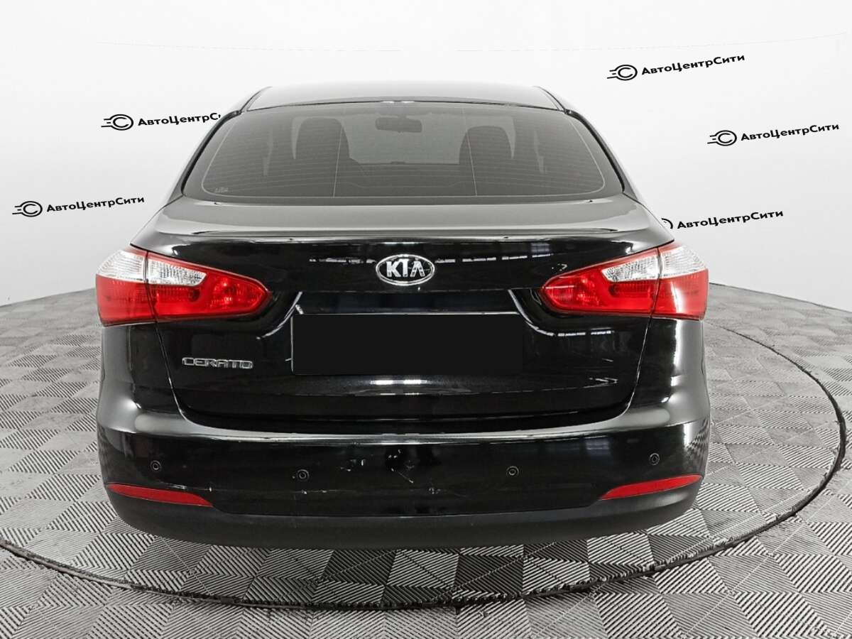 Kia Cerato с пробегом — 2013 год. Фото: #5