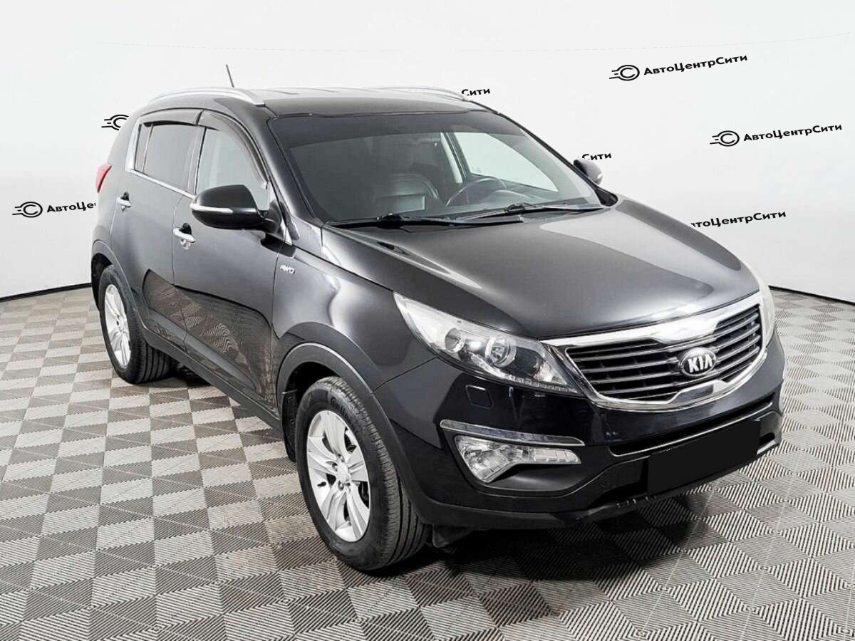 Kia Sportage с пробегом — 2012 год. Фото: #2