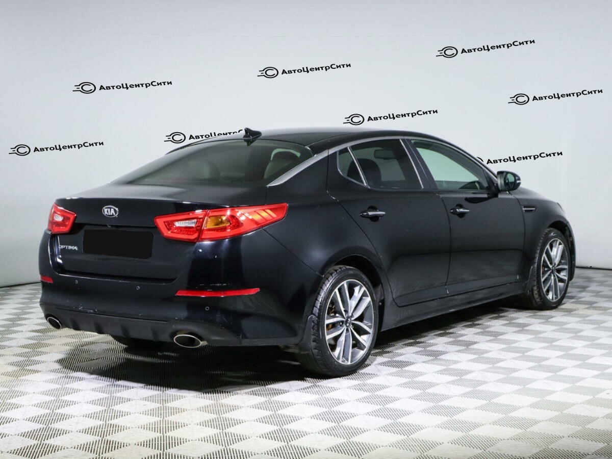 Kia Optima с пробегом — 2014 год. Фото: #3