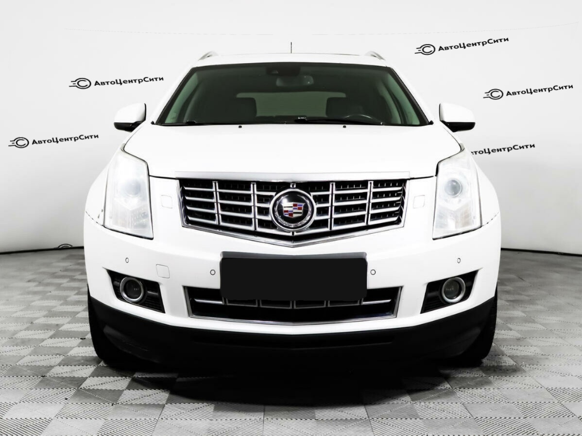 Cadillac SRX с пробегом — 2014 год. Фото: #1
