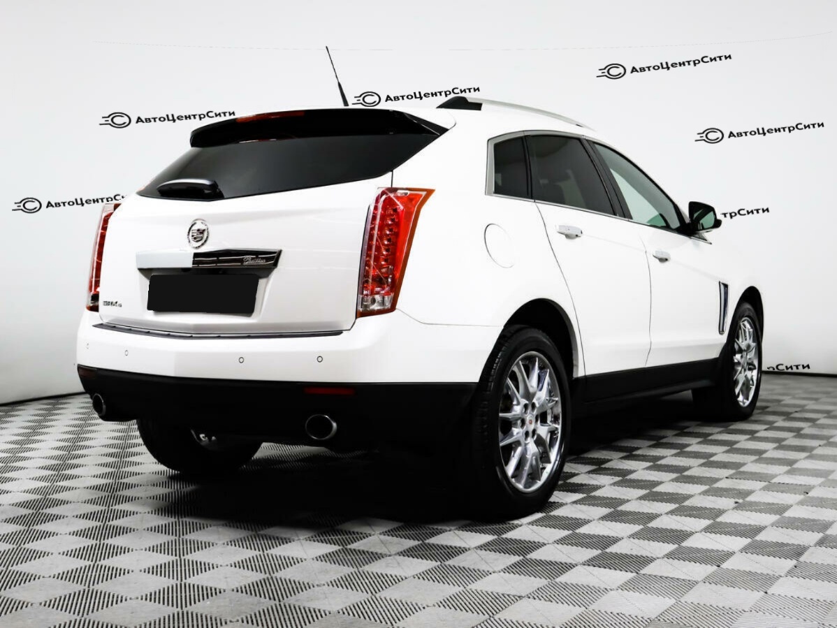 Cadillac SRX с пробегом — 2014 год. Фото: #3