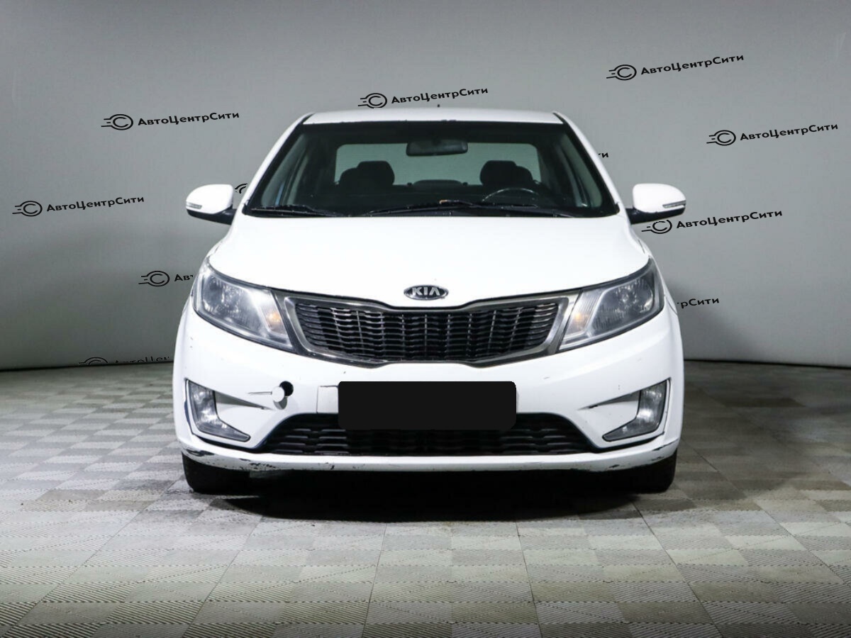 Kia Rio с пробегом — 2014 год. Фото: #1