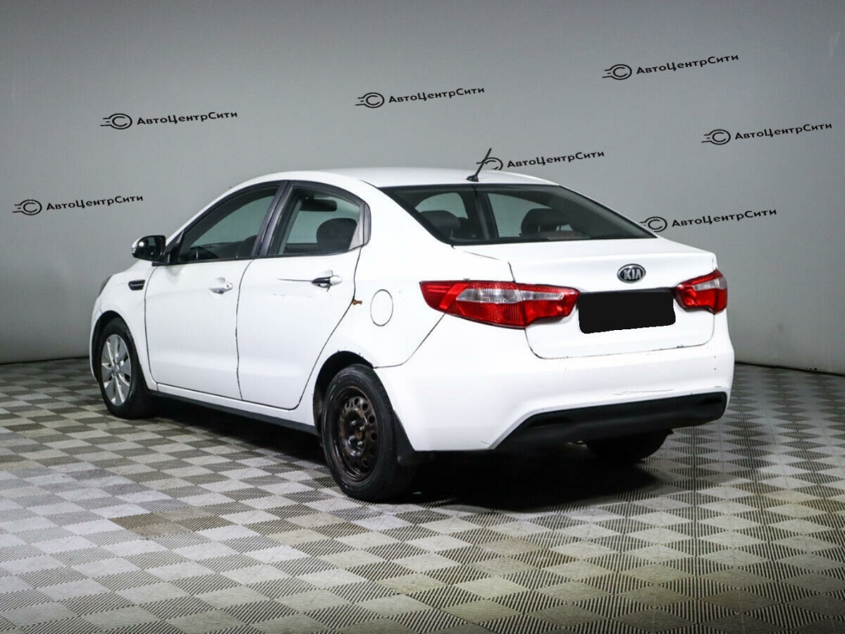 Kia Rio с пробегом — 2014 год. Фото: #6