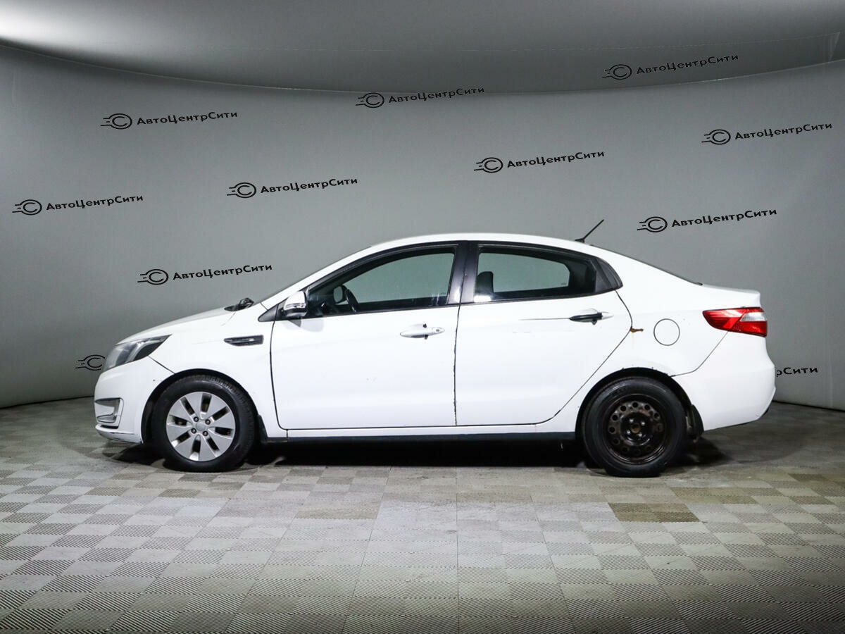 Kia Rio с пробегом — 2014 год. Фото: #7