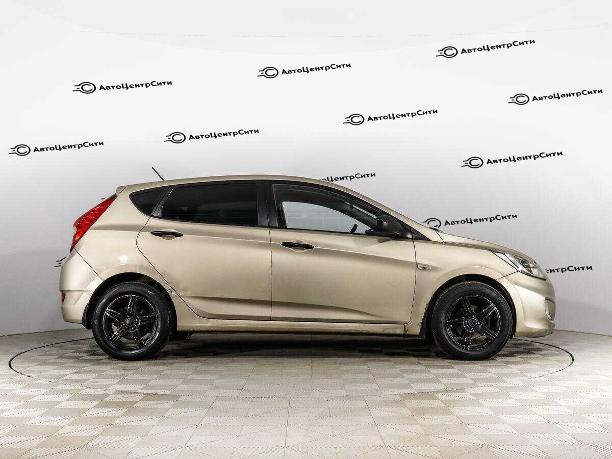 Hyundai Solaris с пробегом — 2013 год. Фото: #3