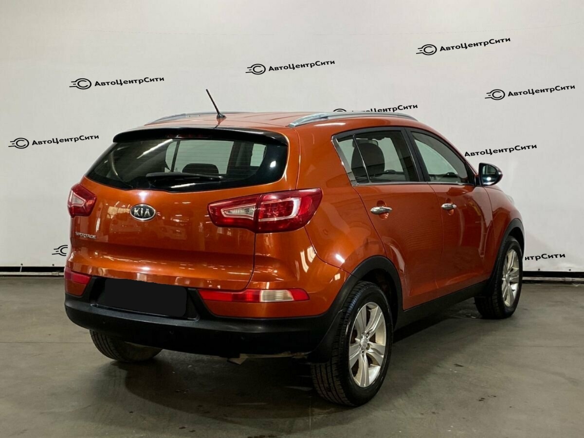 Kia Sportage с пробегом — 2012 год. Фото: #4