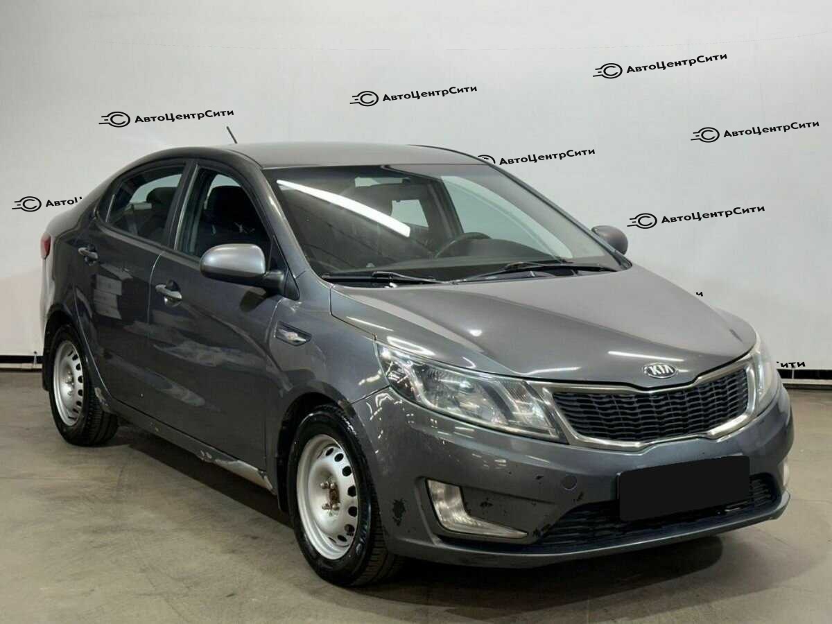 Kia Rio с пробегом — 2013 год. Фото: #2