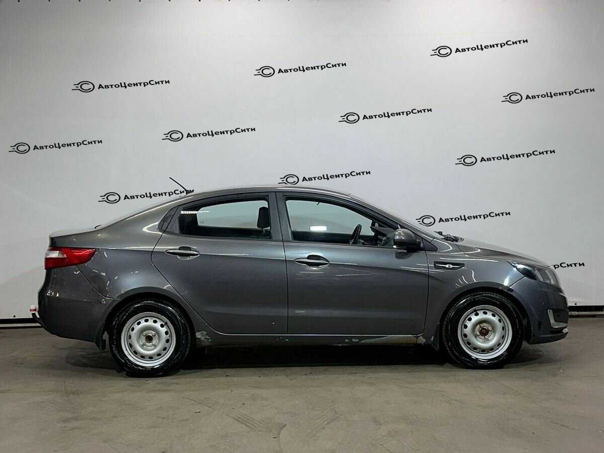 Kia Rio с пробегом — 2013 год. Фото: #3