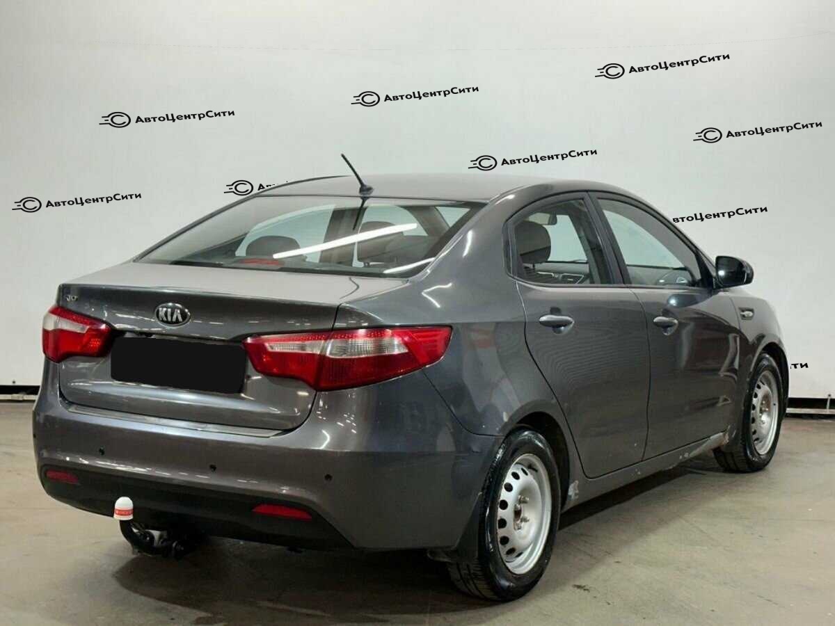 Kia Rio с пробегом — 2013 год. Фото: #4