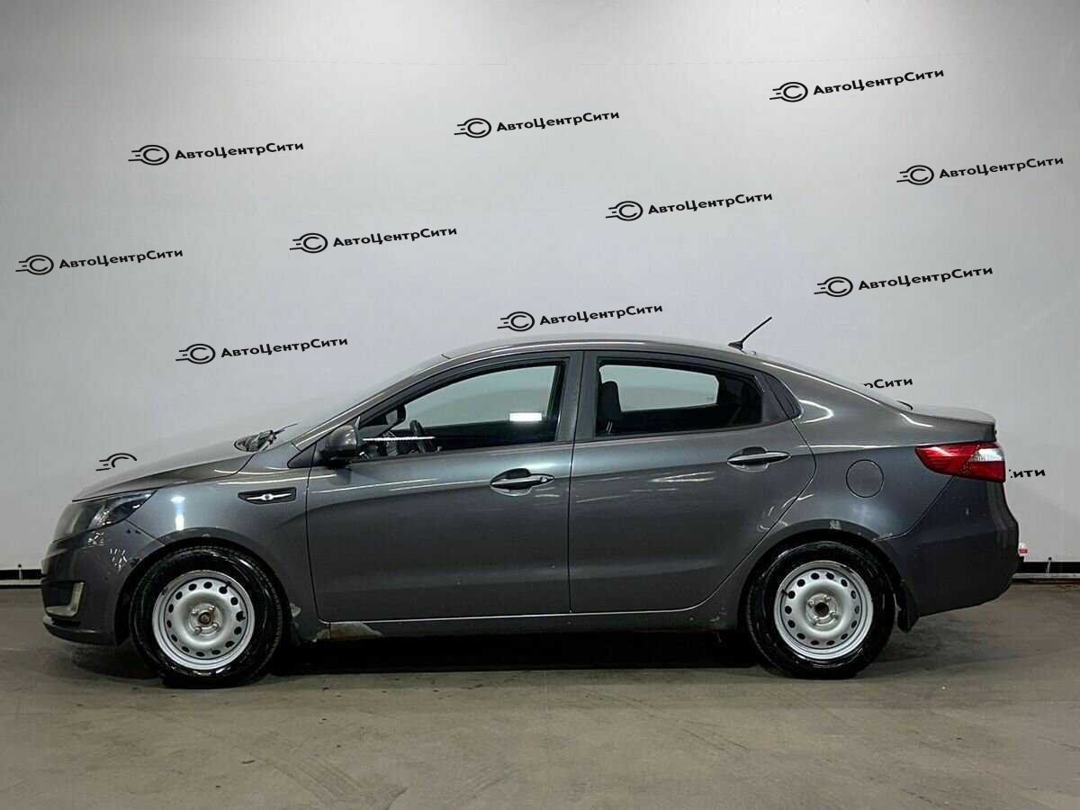 Kia Rio с пробегом — 2013 год. Фото: #7