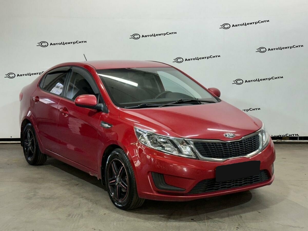 Kia Rio с пробегом — 2013 год. Фото: #2
