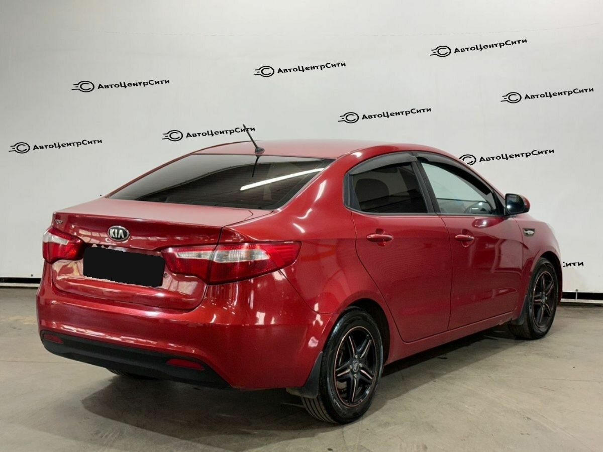 Kia Rio с пробегом — 2013 год. Фото: #4