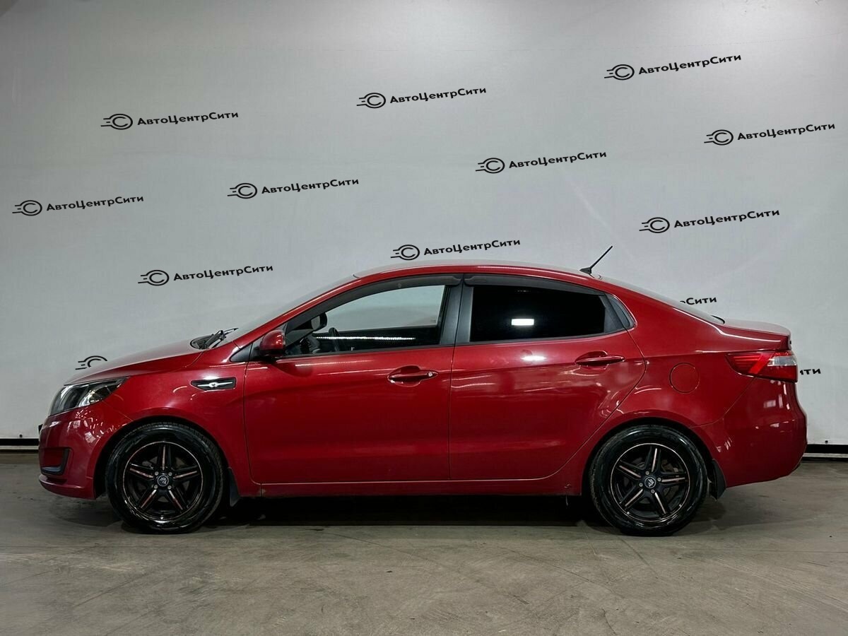 Kia Rio с пробегом — 2013 год. Фото: #7