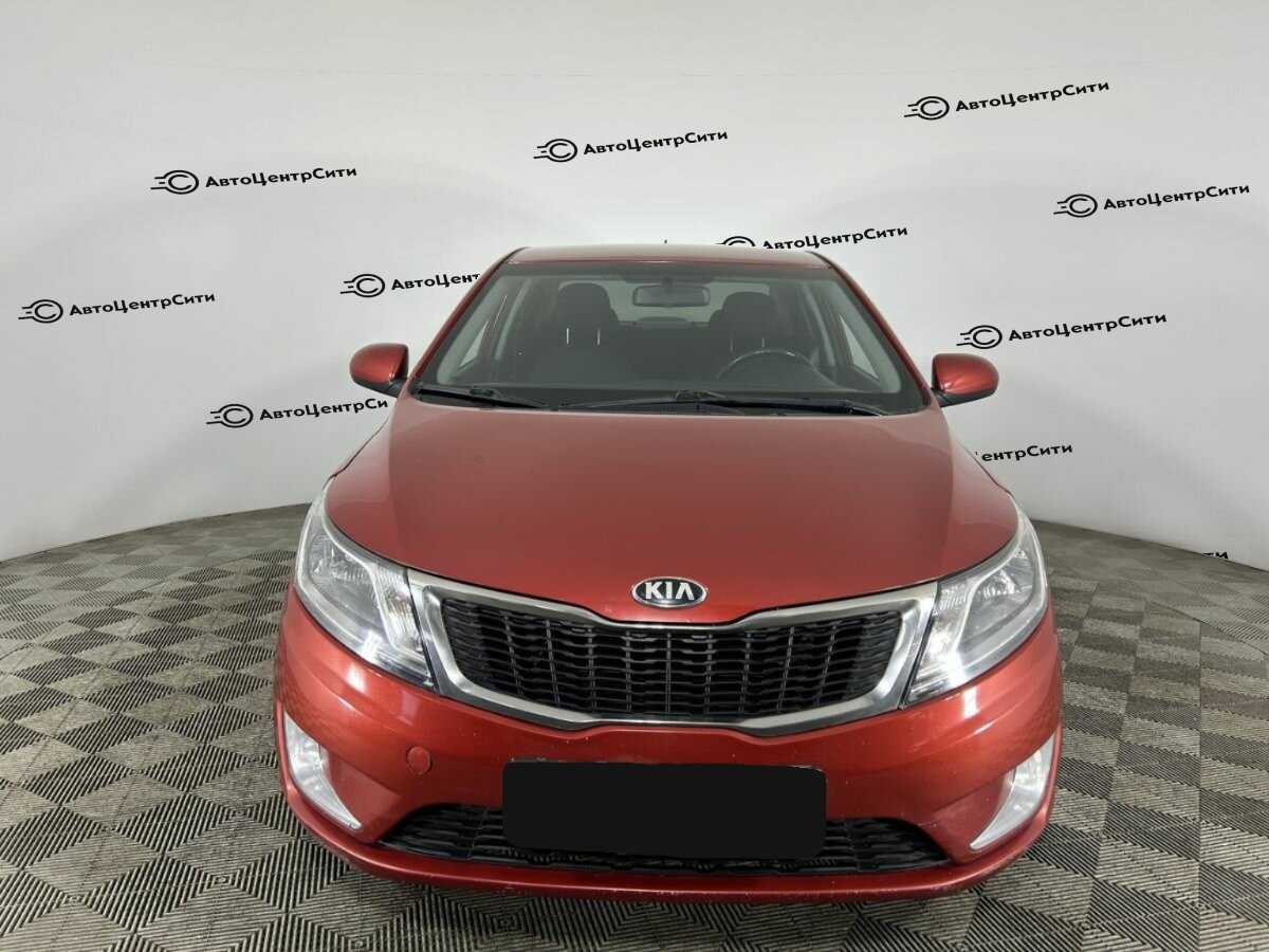 Kia Rio с пробегом — 2014 год. Фото: #1