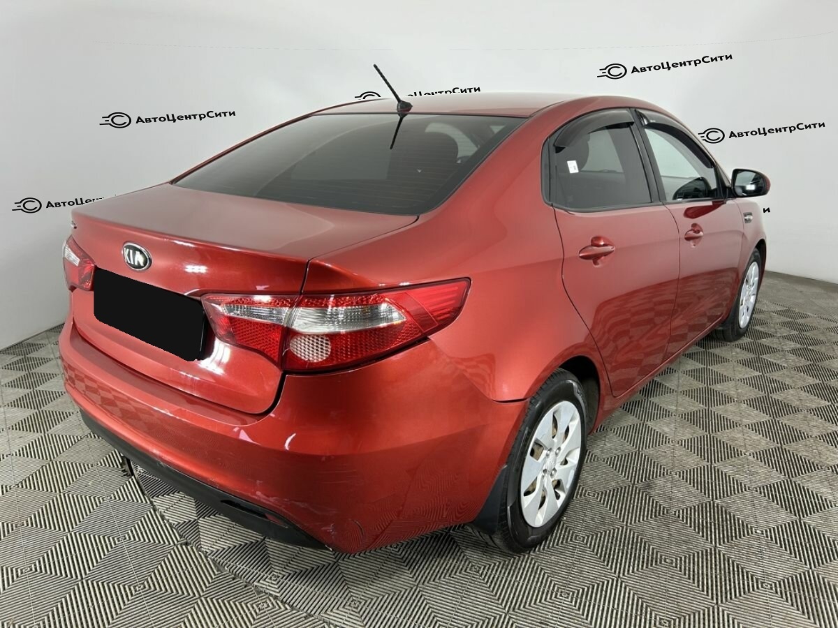 Kia Rio с пробегом — 2014 год. Фото: #4