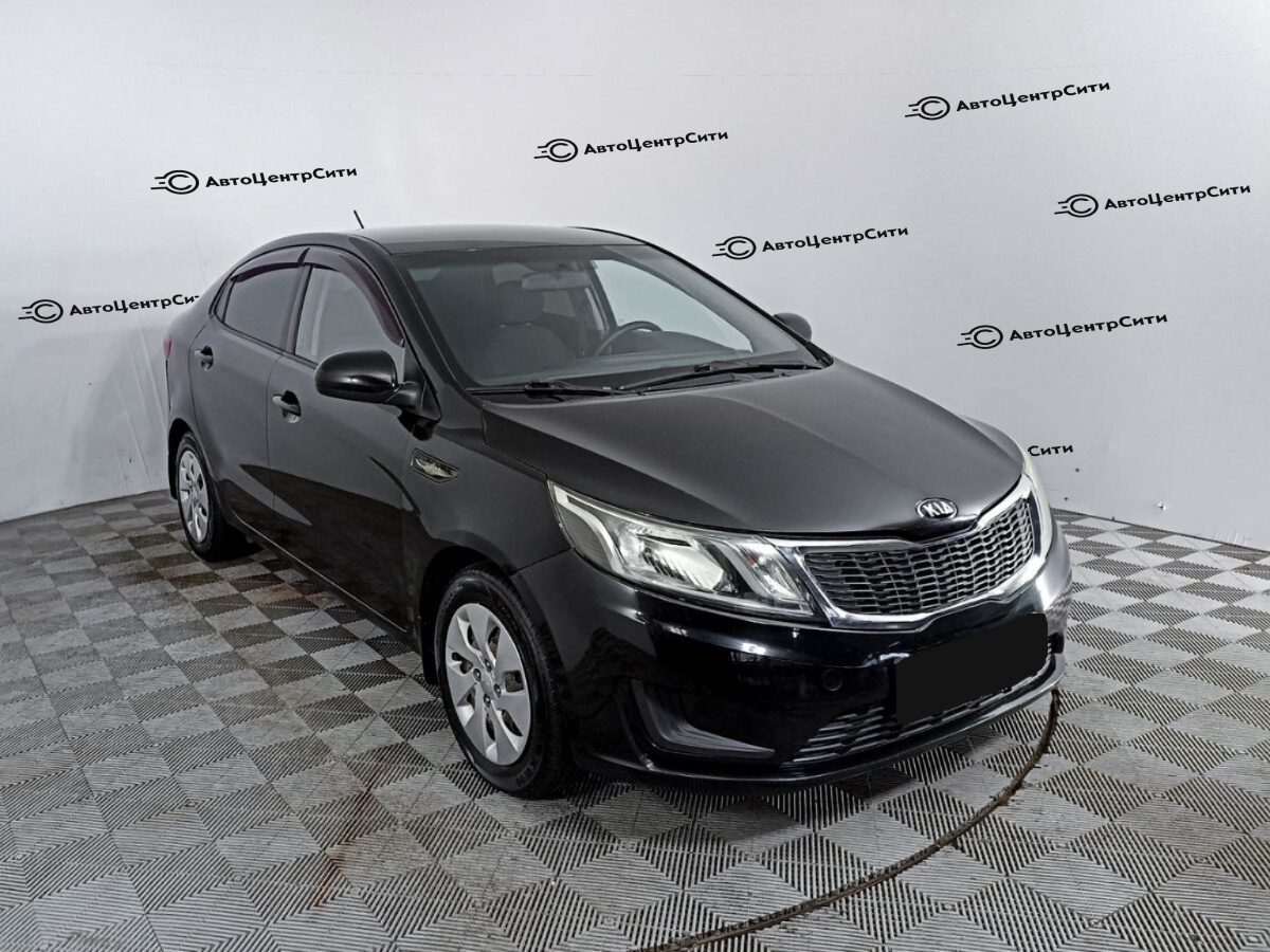 Kia Rio с пробегом — 2014 год. Фото: #2