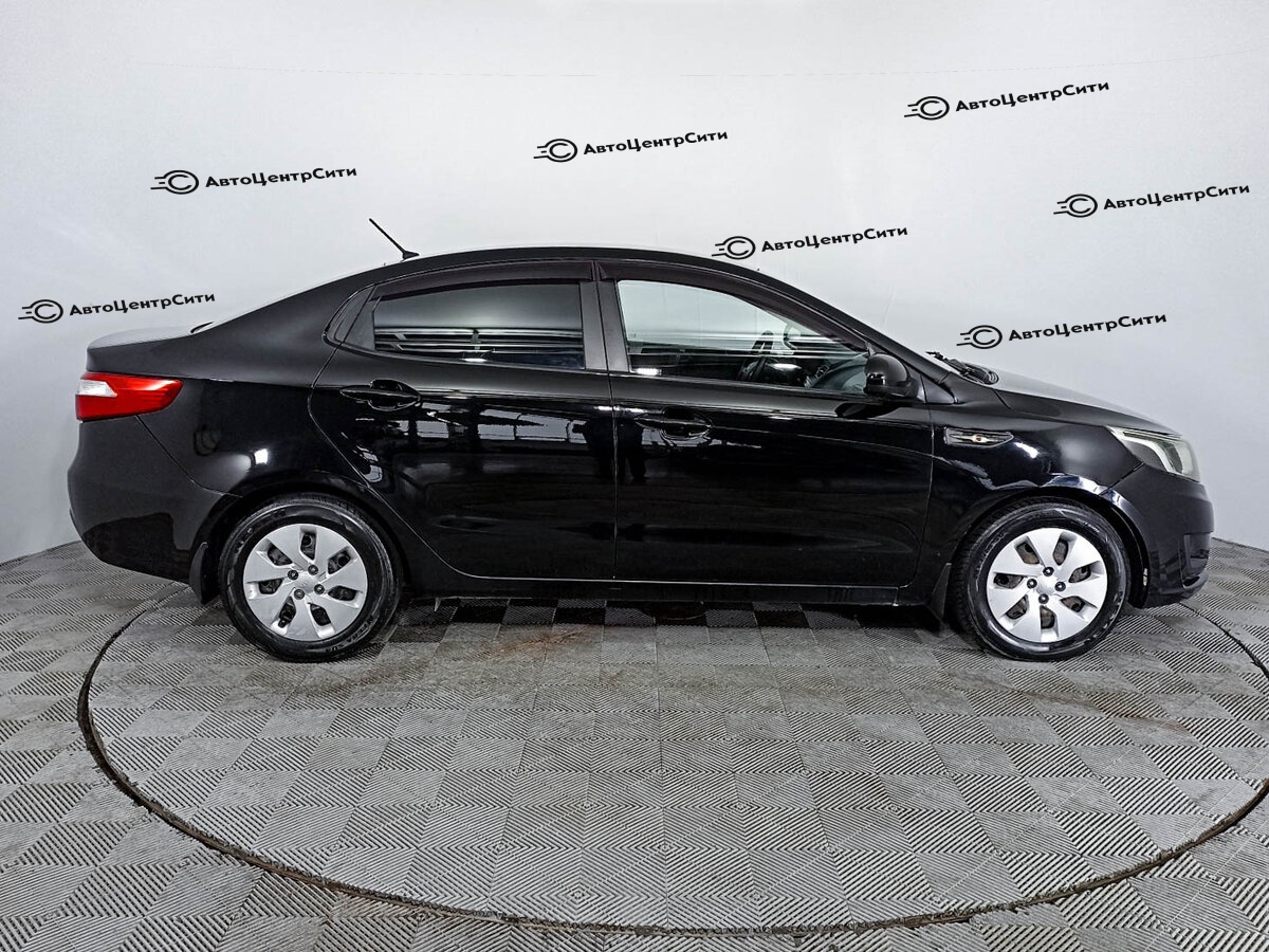 Kia Rio с пробегом — 2014 год. Фото: #3
