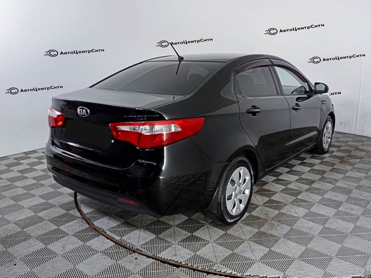 Kia Rio с пробегом — 2014 год. Фото: #4