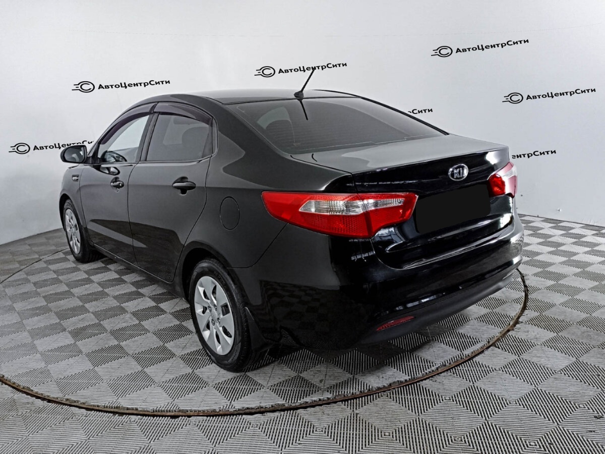 Kia Rio с пробегом — 2014 год. Фото: #6