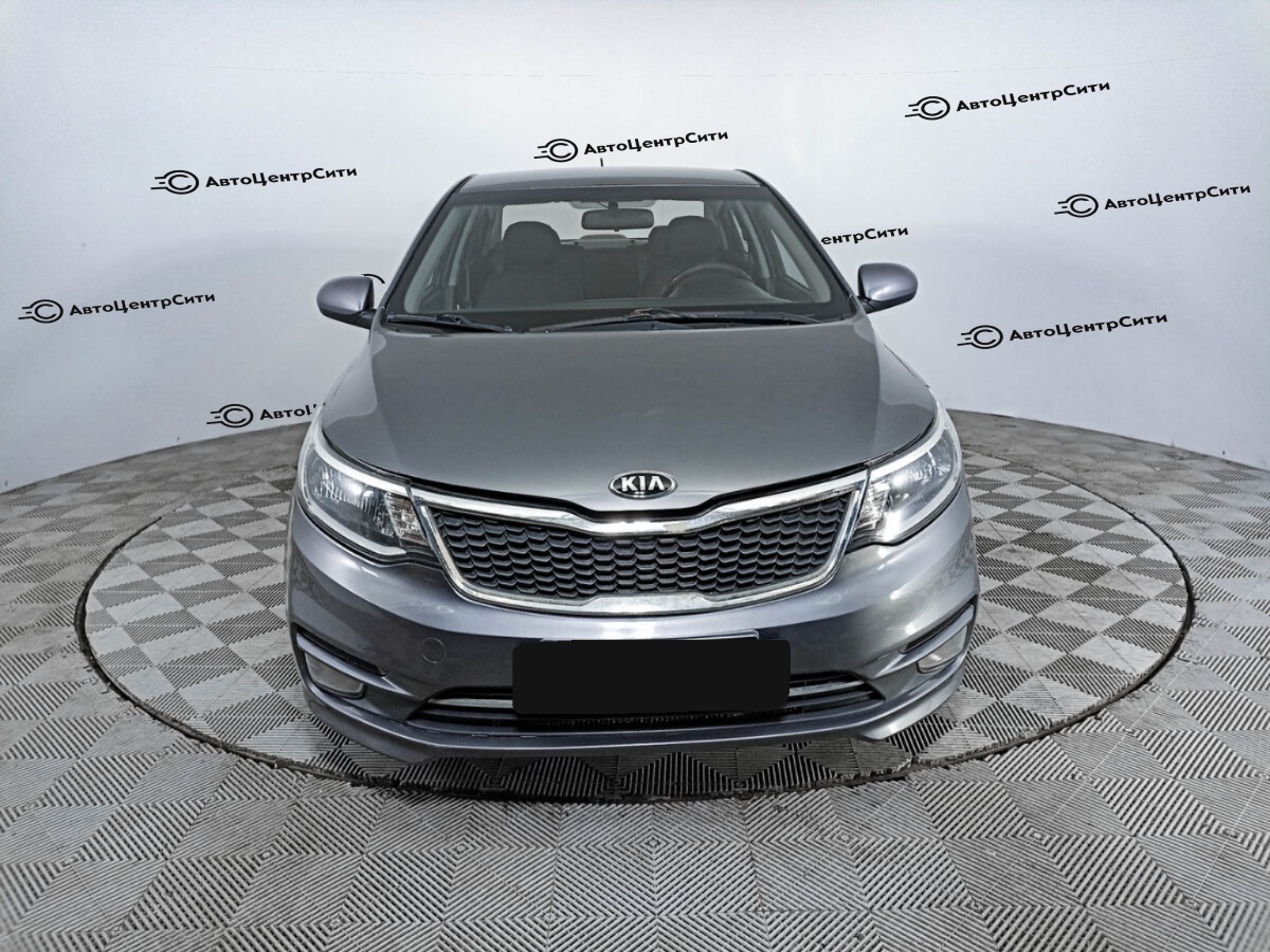 Kia Rio с пробегом — 2015 год. Фото: #1
