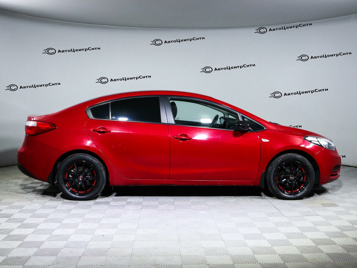 Kia Cerato с пробегом — 2014 год. Фото: #3