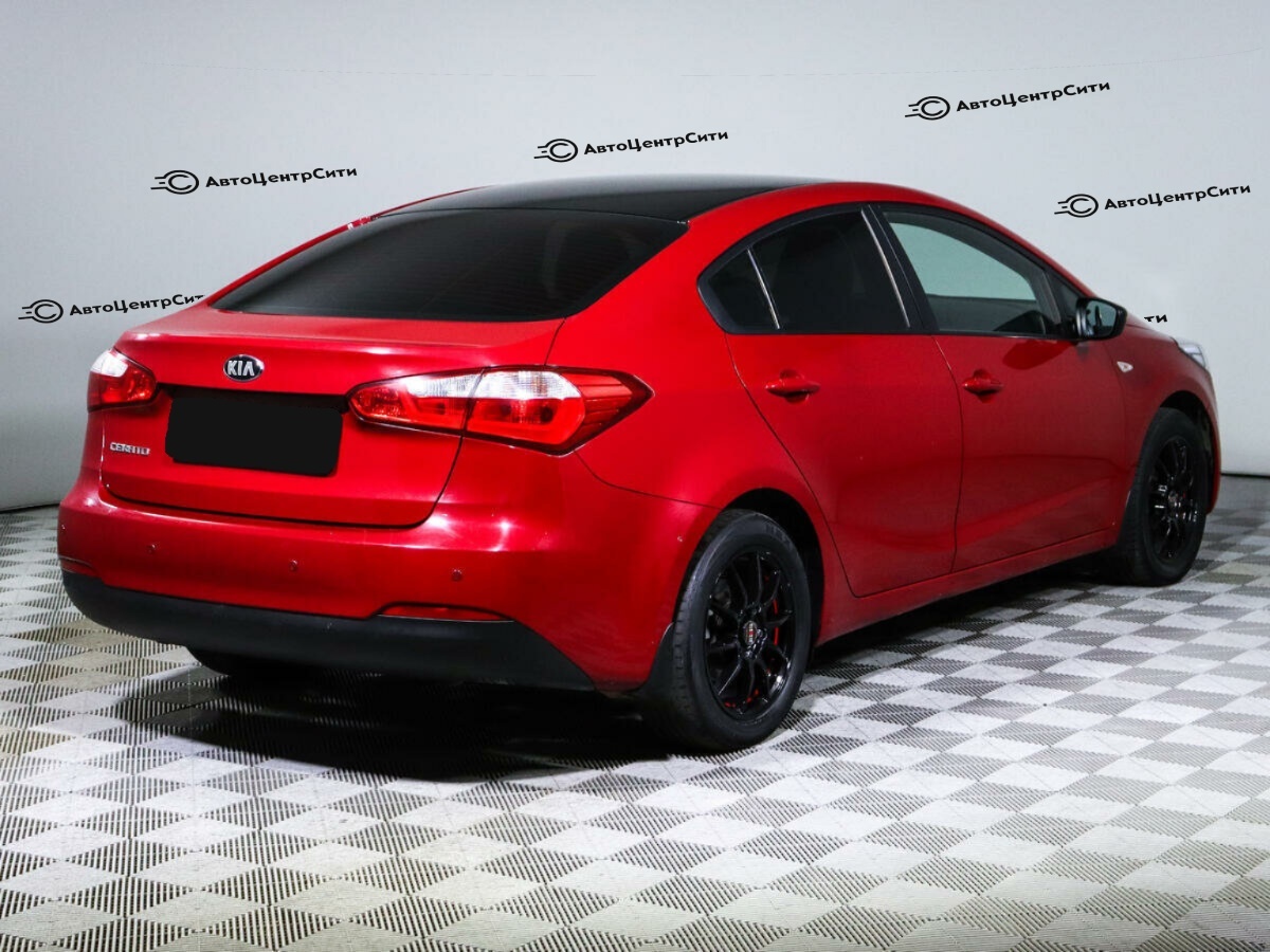 Kia Cerato с пробегом — 2014 год. Фото: #4