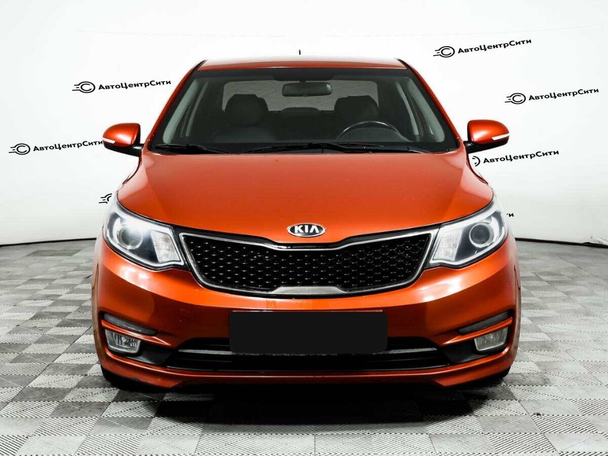 Kia Rio с пробегом — 2015 год. Фото: #1