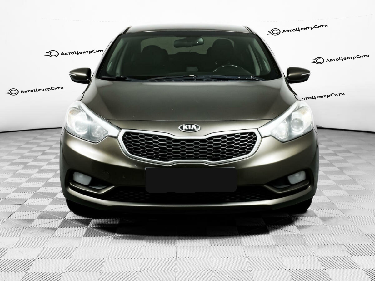 Kia Cerato с пробегом — 2014 год. Фото: #1