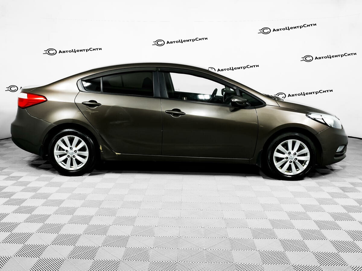 Kia Cerato с пробегом — 2014 год. Фото: #3