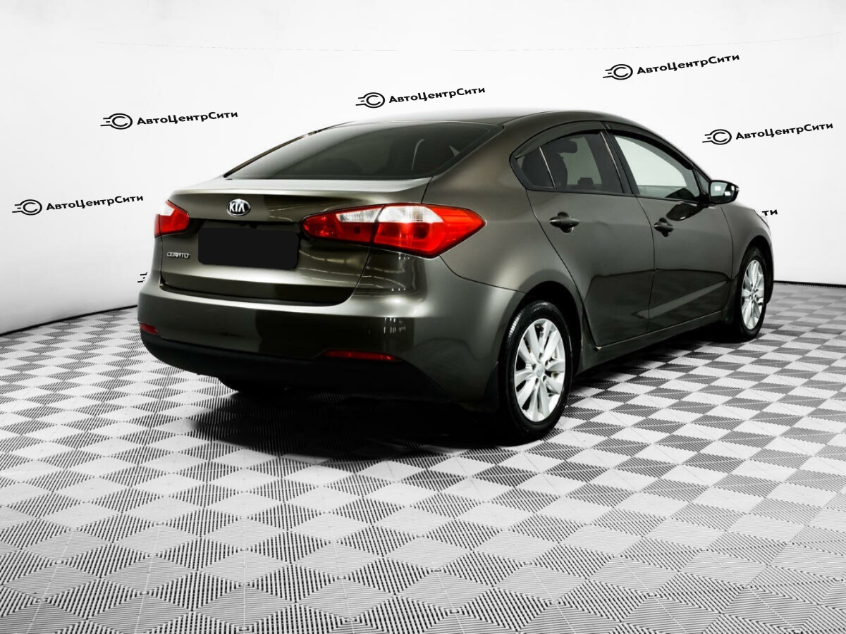 Kia Cerato с пробегом — 2014 год. Фото: #4
