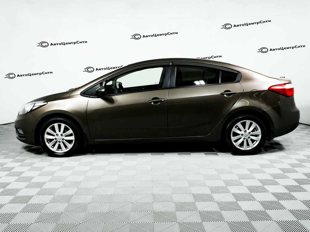 Kia Cerato с пробегом — 2014 год. Фото: #7