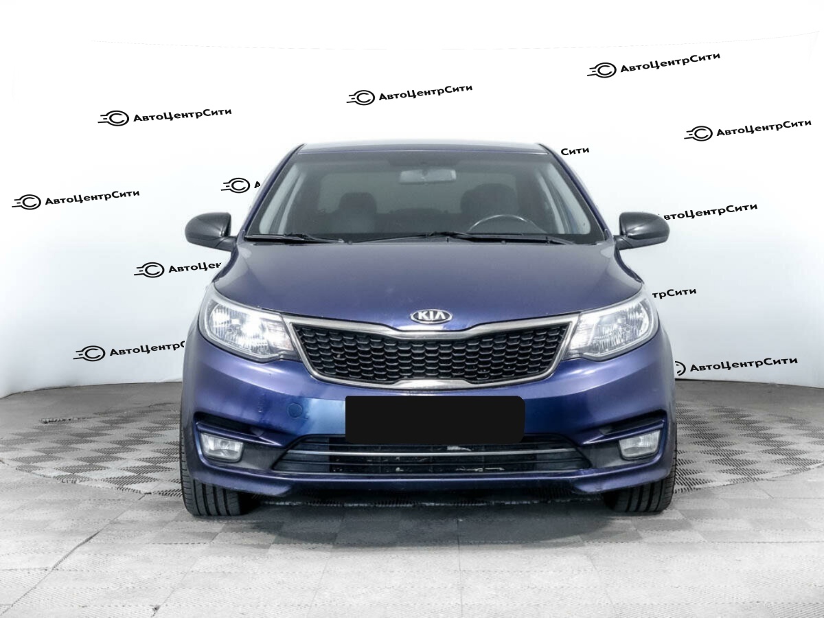 Kia Rio с пробегом — 2015 год. Фото: #1
