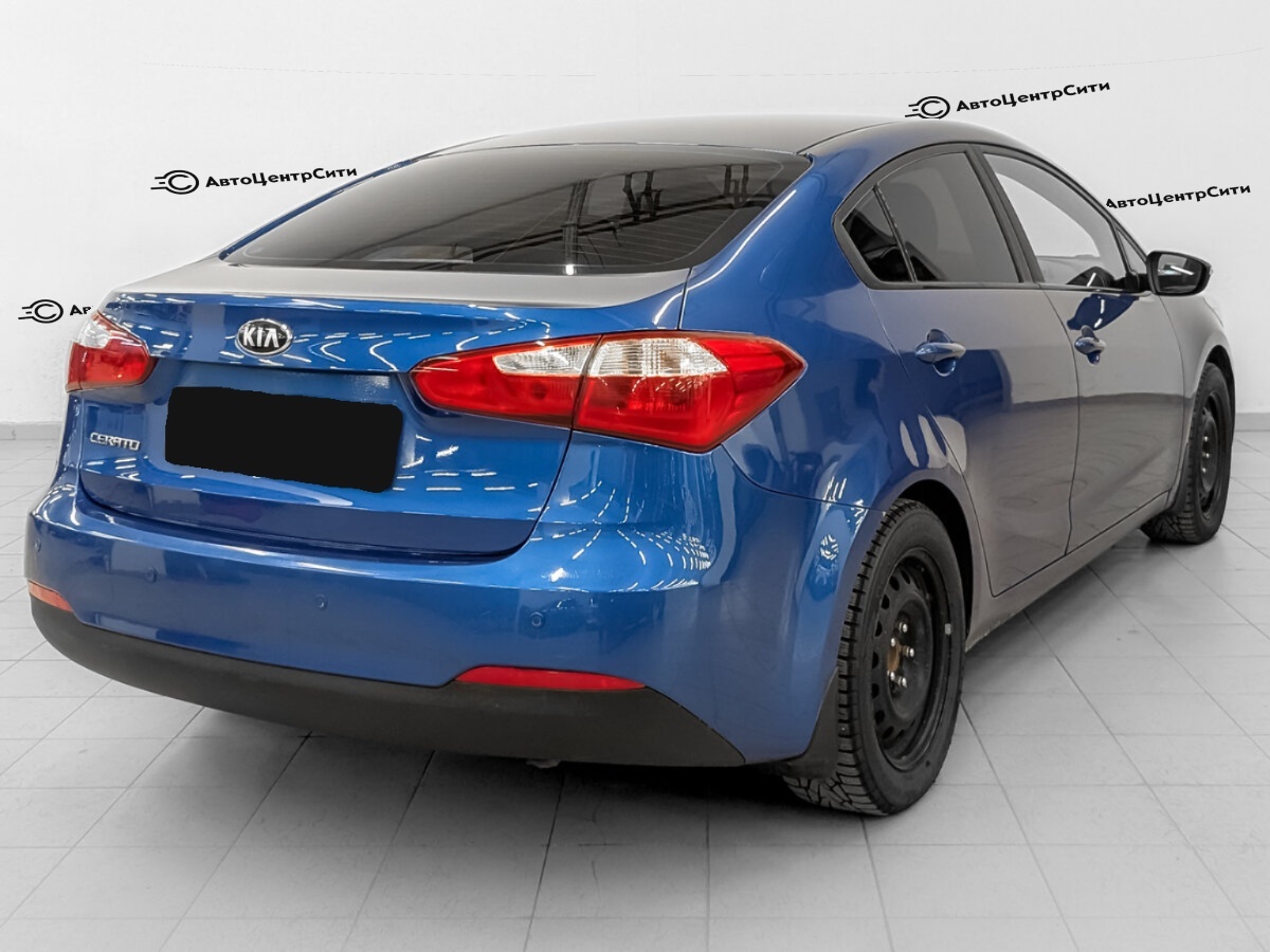 Kia Cerato с пробегом — 2013 год. Фото: #4