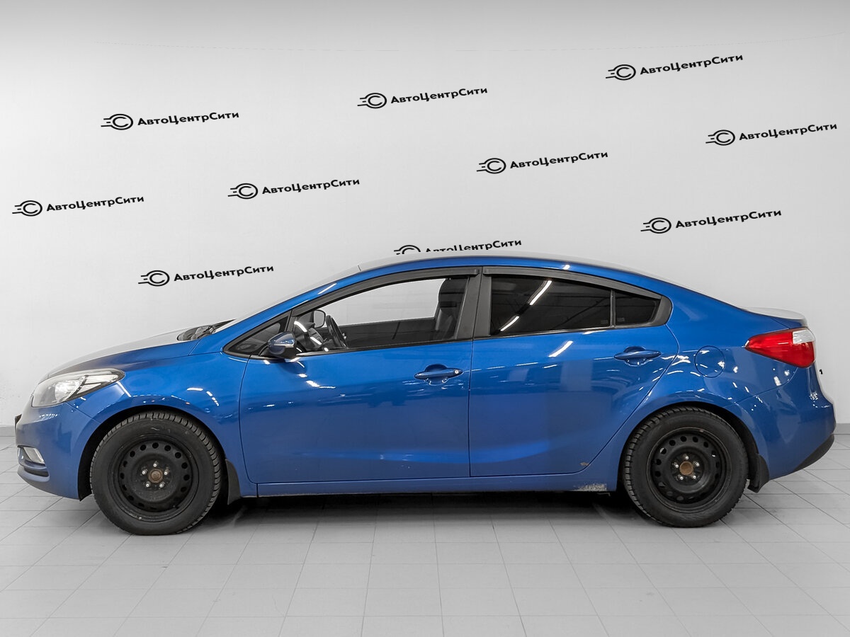 Kia Cerato с пробегом — 2013 год. Фото: #7