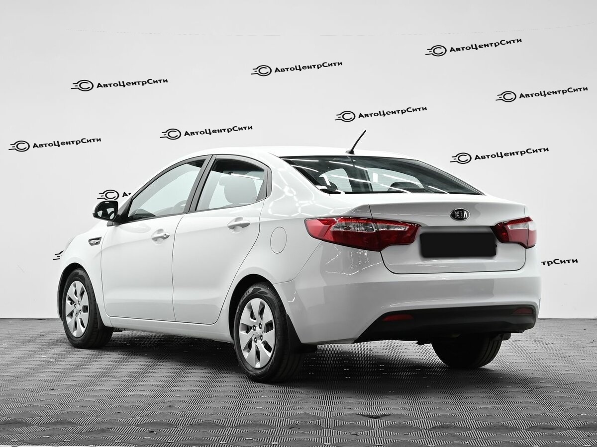 Kia Rio с пробегом — 2013 год. Фото: #2