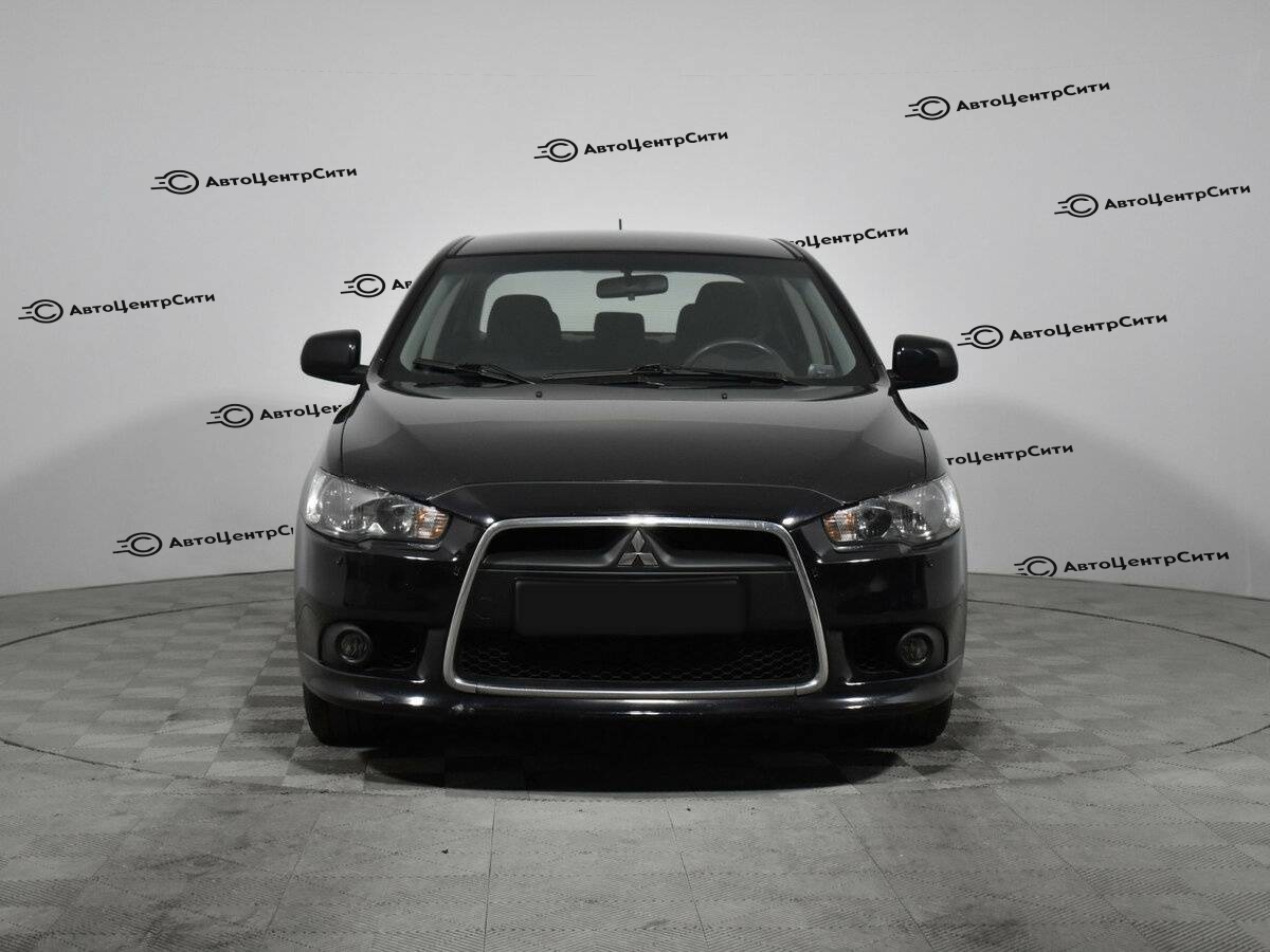 Mitsubishi Lancer с пробегом — 2012 год. Фото: #1
